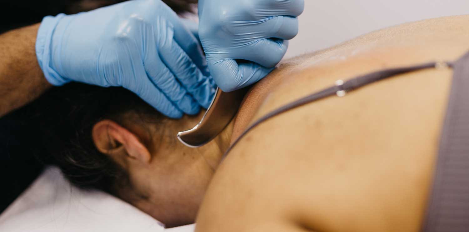 Soft tissue mobilisation therapy benefits Graston therapy London